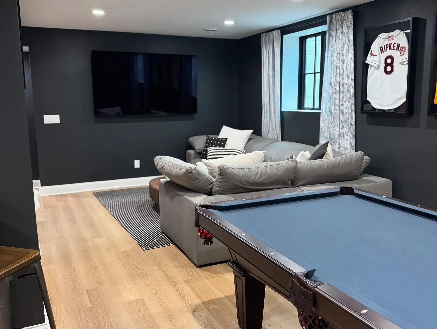 Lower-level lounge and media wall