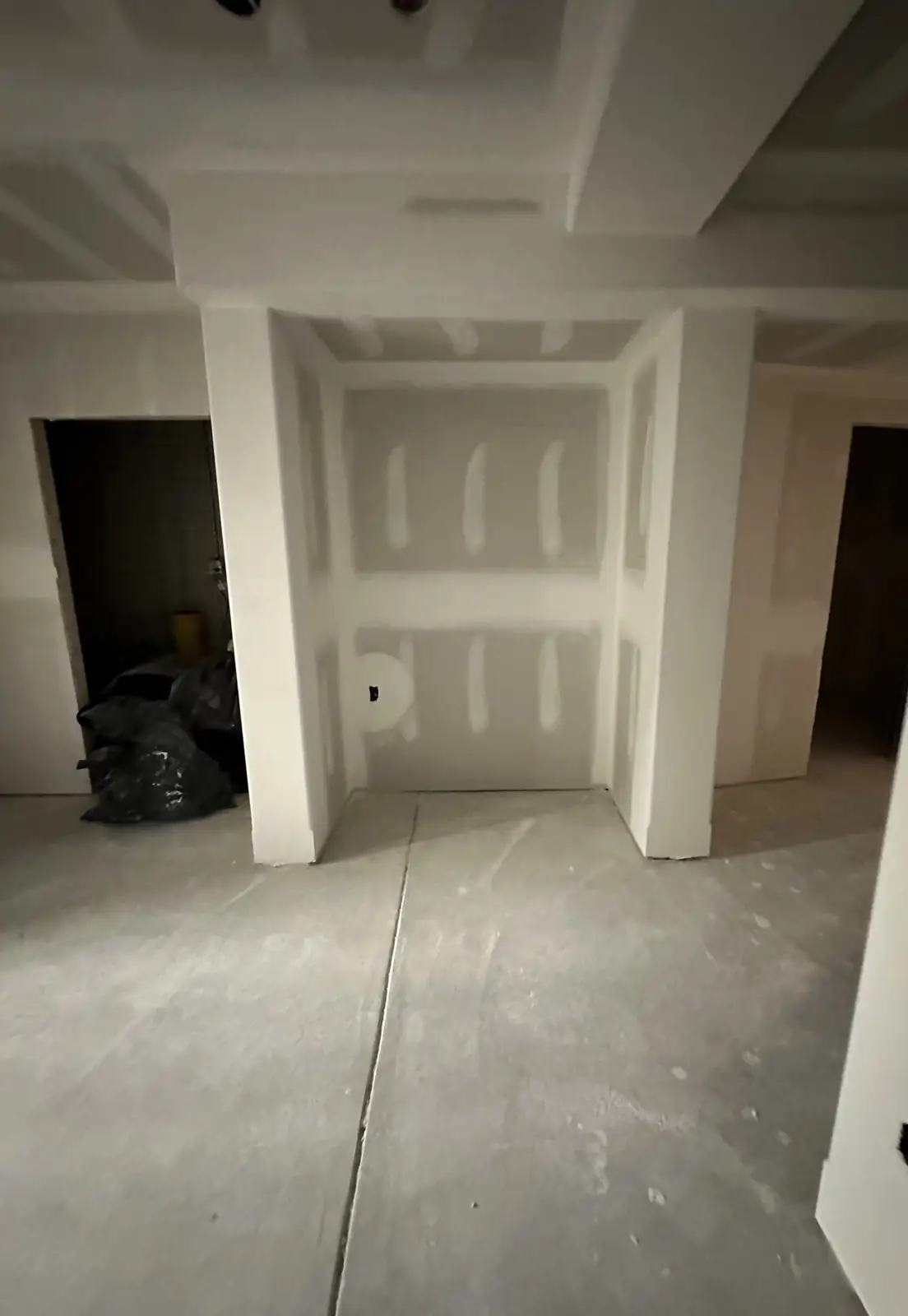 Bar alcove before — bare drywall