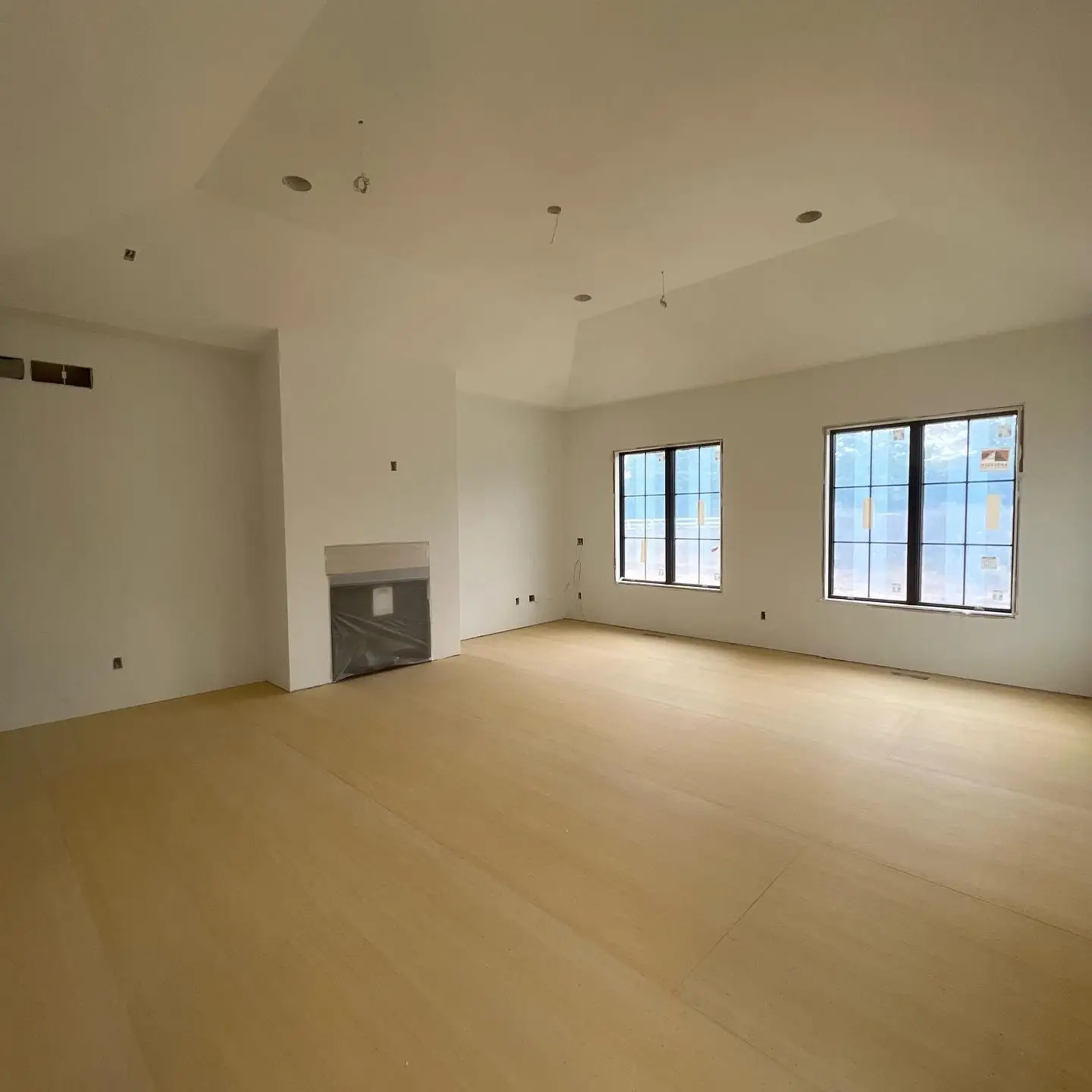 Primary bedroom at the drywall stage