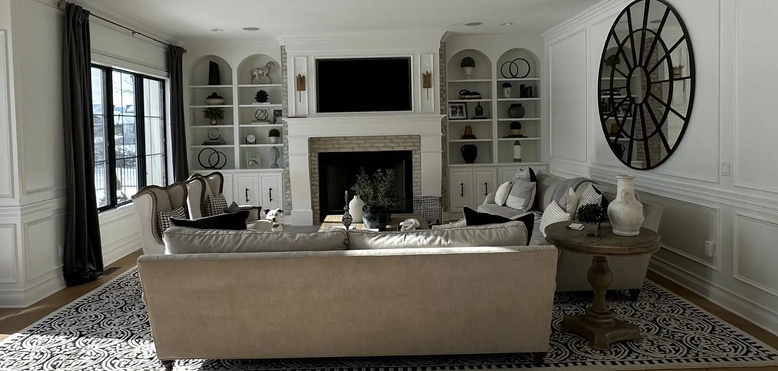 The living room after — fireplace wall, built-ins and moulding