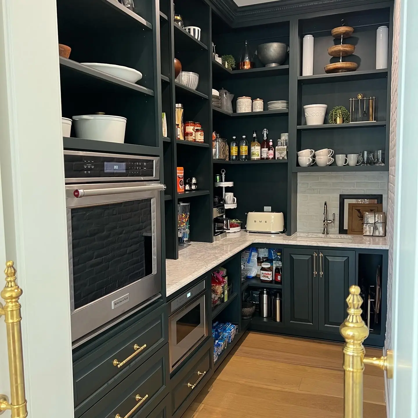 Deep-green butler’s pantry — French-Inspired Residence