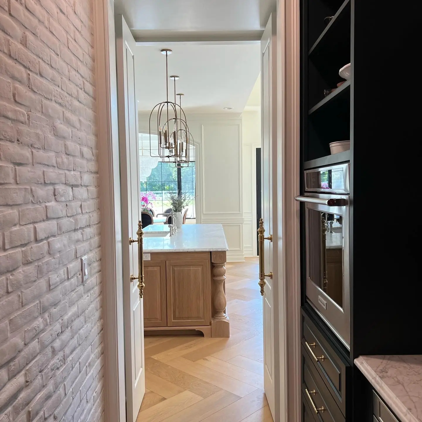 From the pantry back to the kitchen — French-Inspired Residence