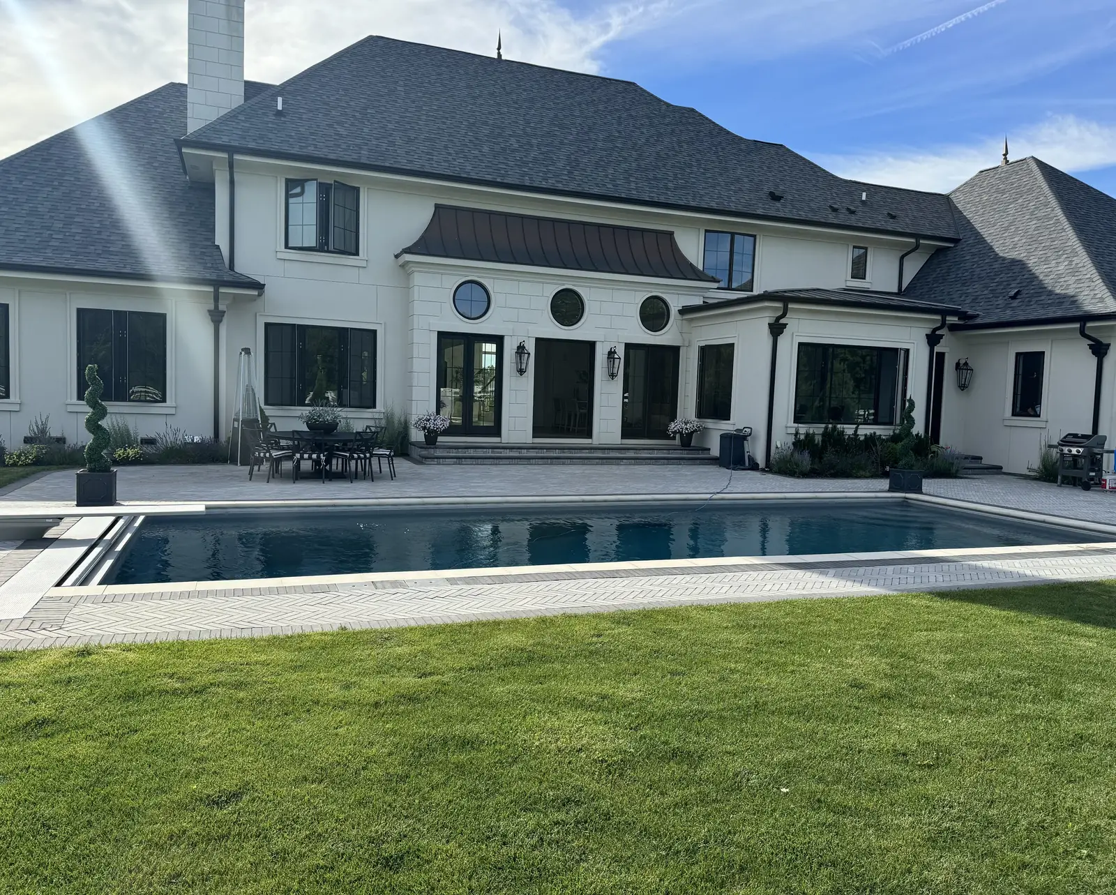Pool and rear terrace — French-Inspired Residence