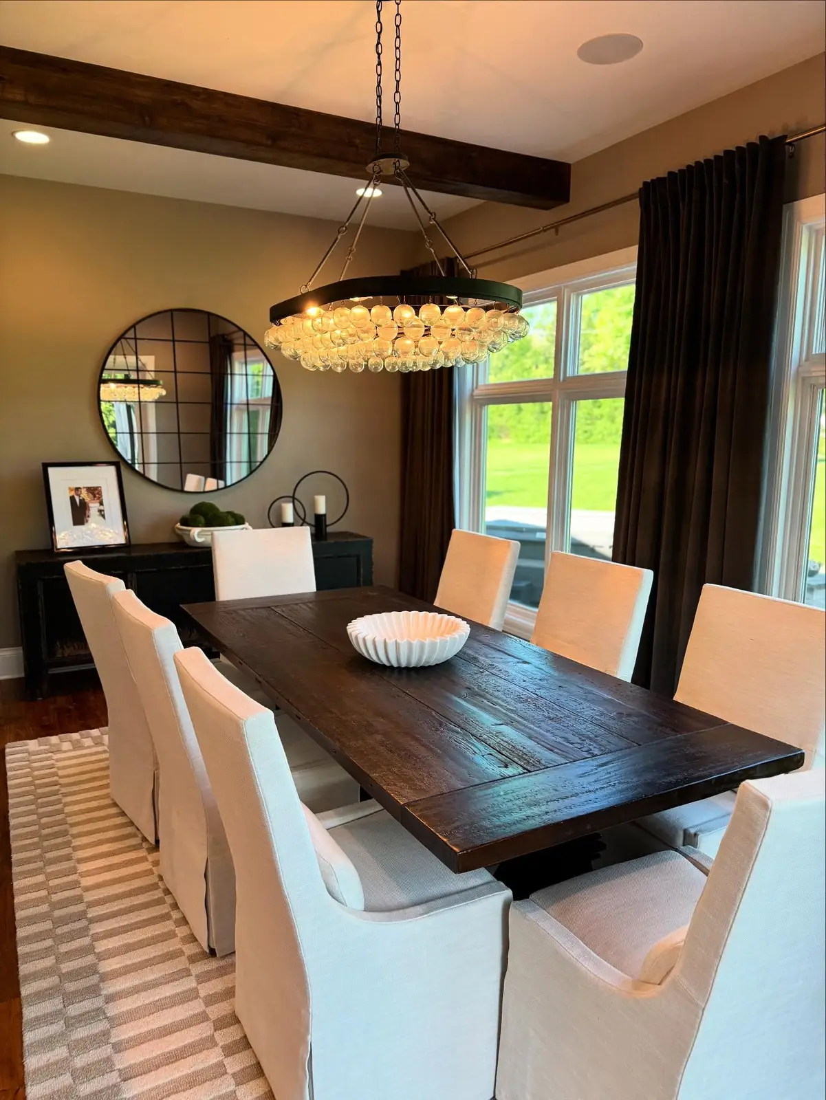 Dining room with a beaded chandelier