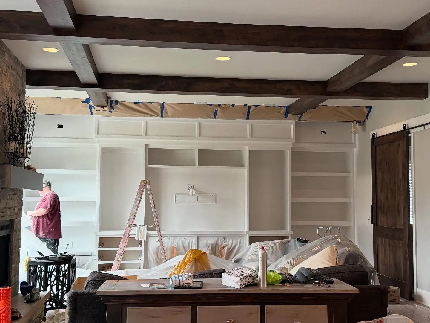 Built-ins being painted during the renovation