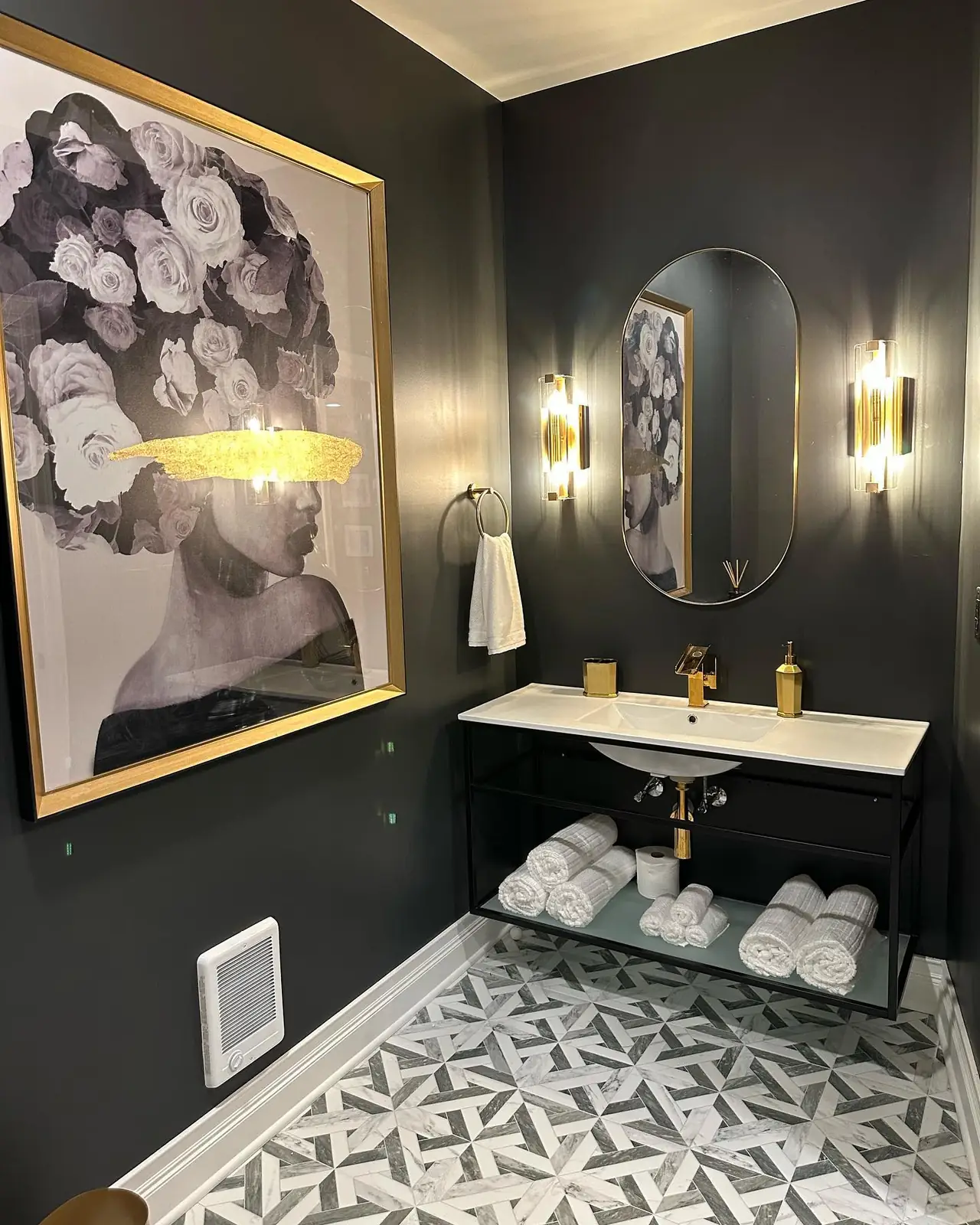 Brass sconces and patterned tile
