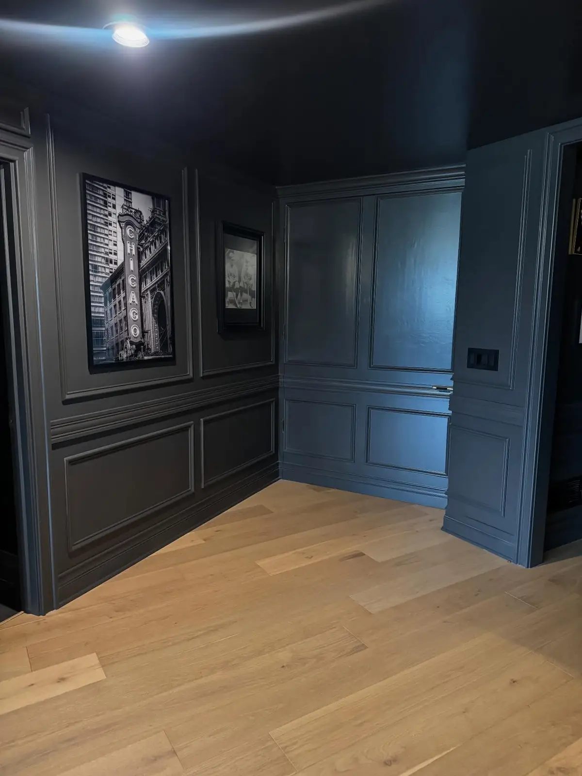 Paneled doors at the end of the hall